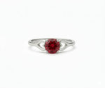 Ruby ring that exudes classic elegance with a vibrant red gemstone centerpiece and refined sparkle
