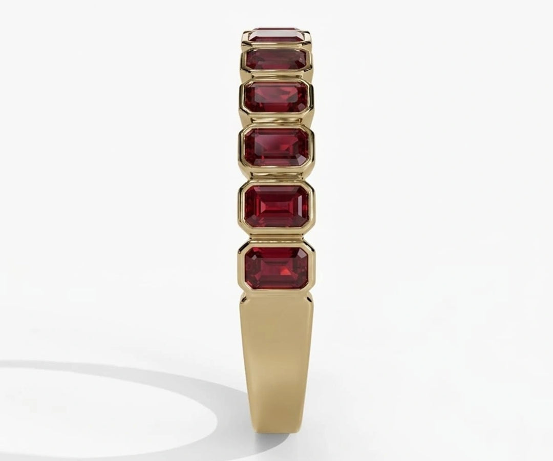 Elegant ruby engagement ring with emerald cut lab-created red ruby stone in sleek silver band for modern womens ruby rings