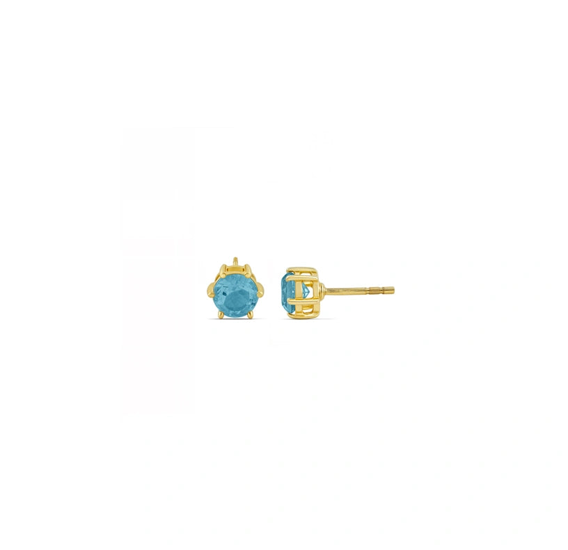 Brilliant blue topaz gemstone studs, crafted for a subtle yet striking birthstone statement
