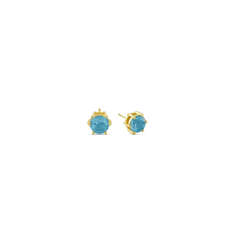 Timeless blue topaz stud earrings in a secure push-back setting, capturing light with dazzling clarity.
