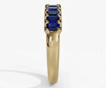 Elegant blue sapphire ring with baguette cut stone set in minimalist silver band for women’s fine jewelry
