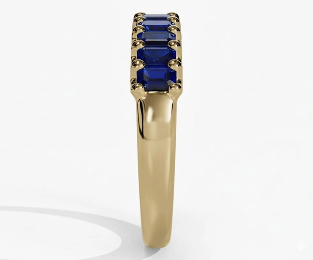 Elegant blue sapphire ring with baguette cut stone set in minimalist silver band for women’s fine jewelry