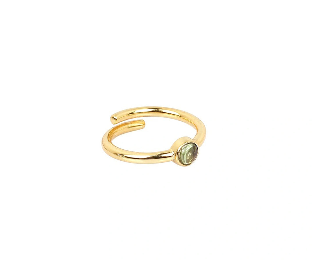 Nature-inspired minimalist ring with a pastel green amethyst stone set in solid 925 sterling silver
