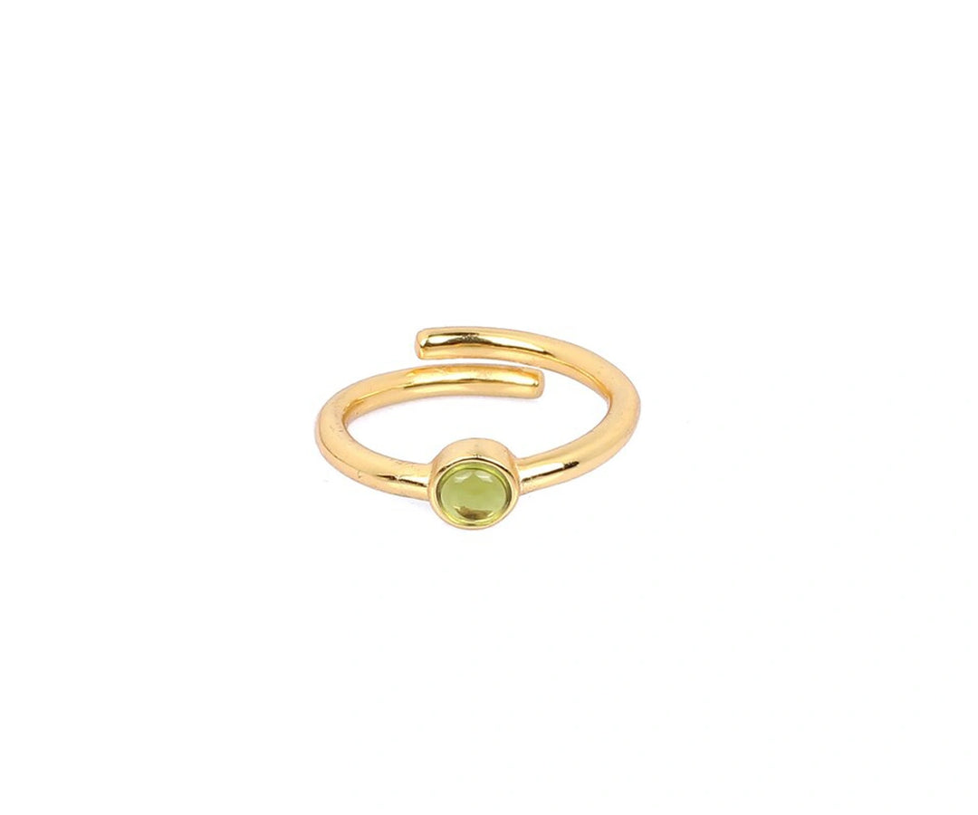 Natural peridot ring with vibrant 5mm green gemstone set in radiant 925 sterling silver for fresh elegance

