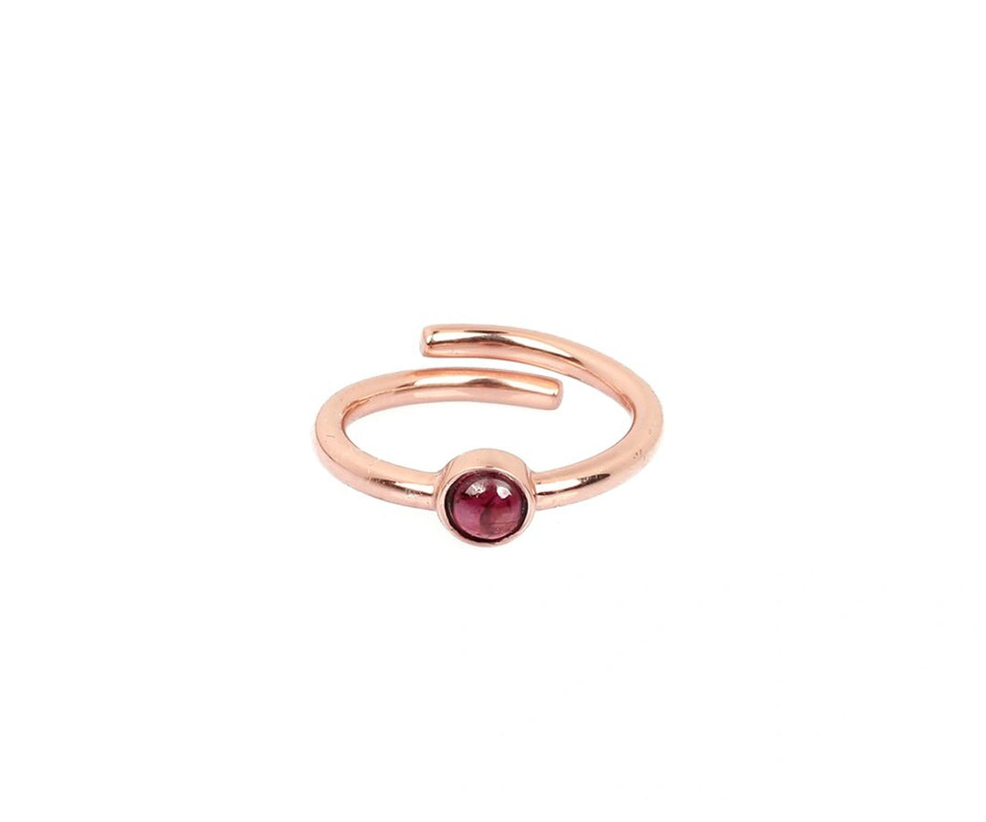 Lightweight silver ring showcasing a vibrant rhodolite garnet, perfect for everyday elegance or special occasions