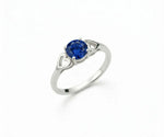 Sapphire and white gemstone ring that blends timeless elegance with a touch of vibrant blue color.
