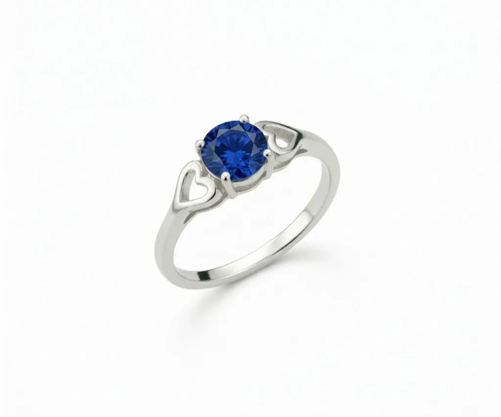 Sapphire and white gemstone ring that blends timeless elegance with a touch of vibrant blue color.