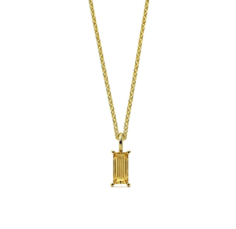 This citrine birthstone necklace features a warm golden-yellow gemstone, beautifully set in a dainty pendant necklace for women.

