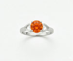 Fire opal gemstone ring with glowing orange hues that bring warmth, charm, and striking beauty
