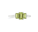 Oval peridot ring with white zircon accents set in sterling silver band offering fresh green brilliance and delicate sparkle
