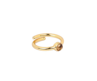 Elegant cherry quartz ring for women with adjustable size, featuring polished pink-red crystal for modern minimalist style.

