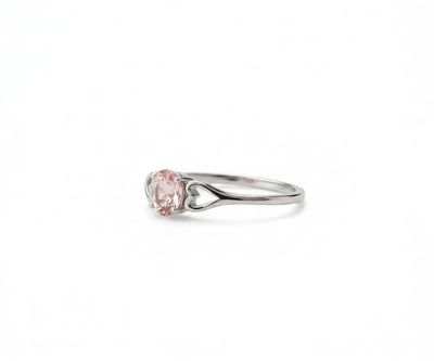 Rose quartz ring featuring soft pink gemstone that radiates delicate elegance and romantic charm