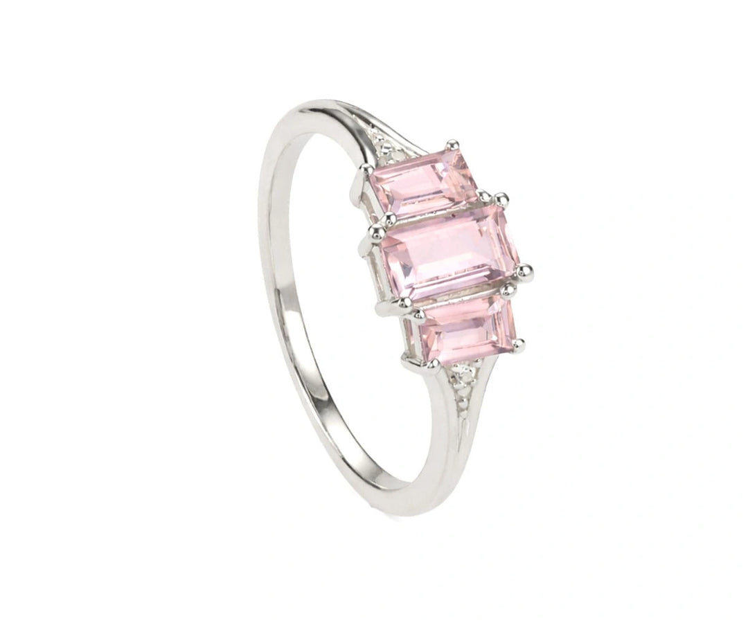 Rose quartz and white zircon ring in sterling silver featuring a soft pink gemstone with delicate sparkling accents