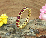 Delicate gold-plated sterling silver ring with a 3mm round pink tourmaline hydro gemstone for romantic elegance

