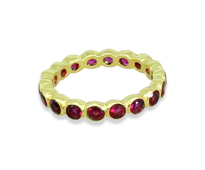 Romantic pink gemstone ring with a dainty tourmaline hydro centerpiece set in warm gold-finished silver

