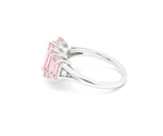Sterling silver rose quartz ring with shimmering white zircon stones that add soft sparkle and feminine charm
