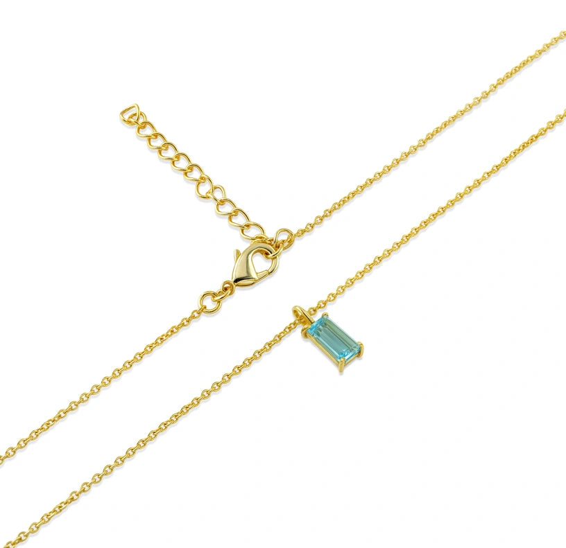 Handcrafted as a minimalist pendant necklace, the blue topaz stone radiates clarity and beauty for women.

