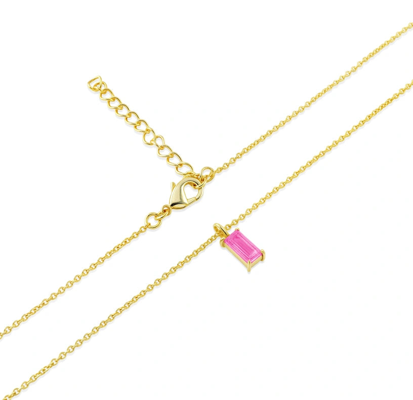 Elegant and timeless, this gold-plated pendant necklace showcases a radiant pink tourmaline gemstone.

