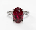 Vintage inspired oval ruby ring with deep crimson gemstone and refined delicate setting, ruby engagement rings
