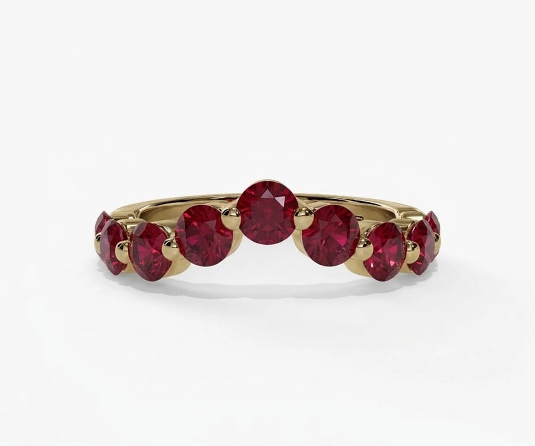 Elegant red ruby ring featuring a round cut lab ruby gemstone set in a classic silver band