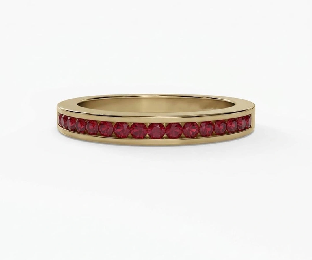 Elegant half eternity ruby ring for women featuring round red gemstones in a sleek minimalist band