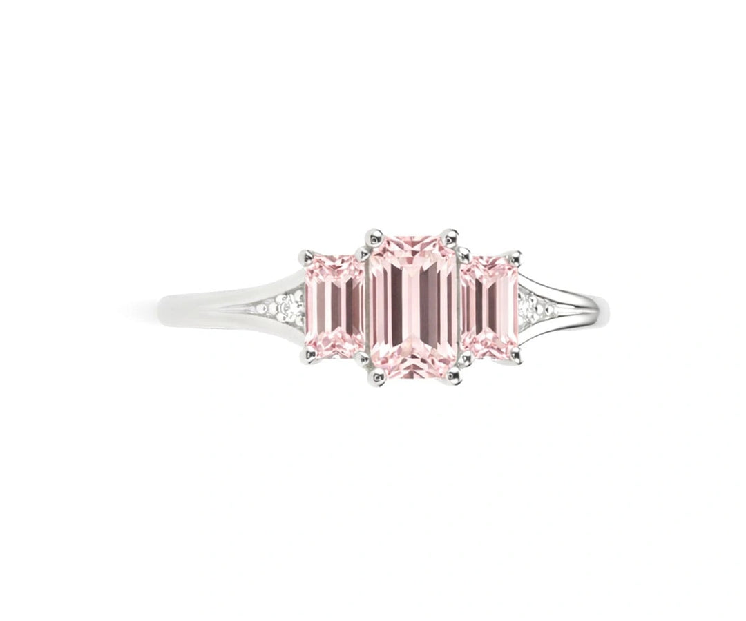 Elegant rose quartz ring with white zircon halo set in sterling silver for a romantic and timeless look