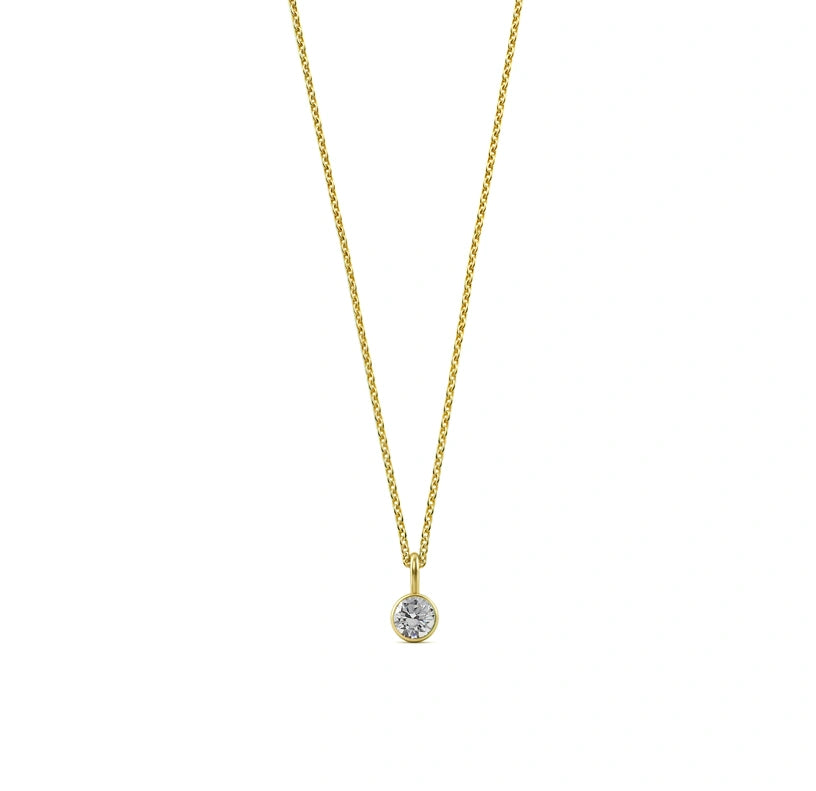 A dainty pendant necklace for women showcasing a diamond zircon — symbolizing strength and purity for April birthdays.

