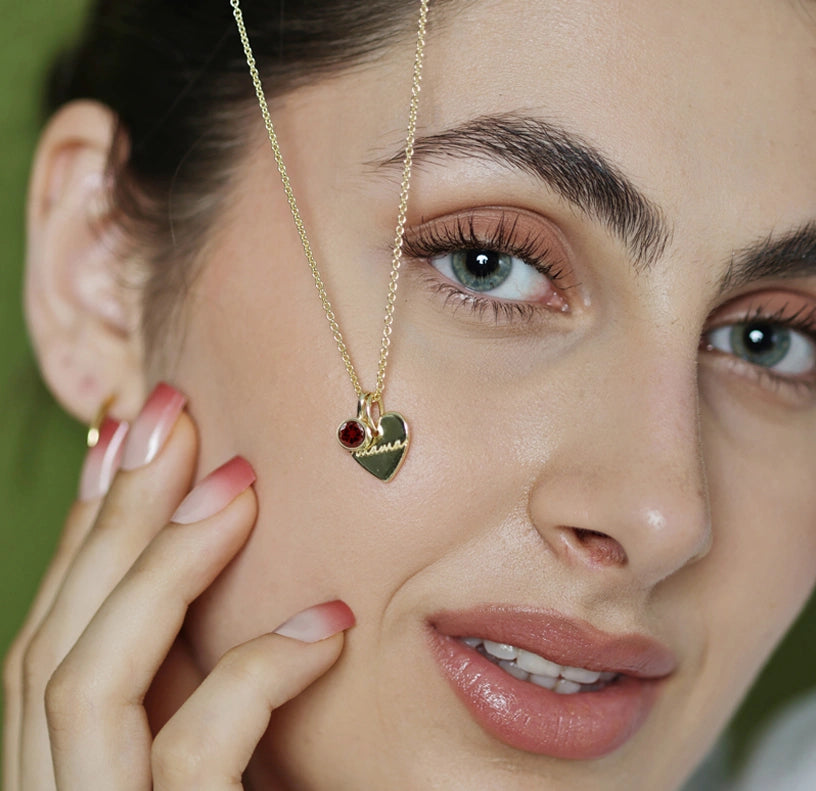 Mother’s birthstone jewelry with custom gemstone arrangement on gold chain