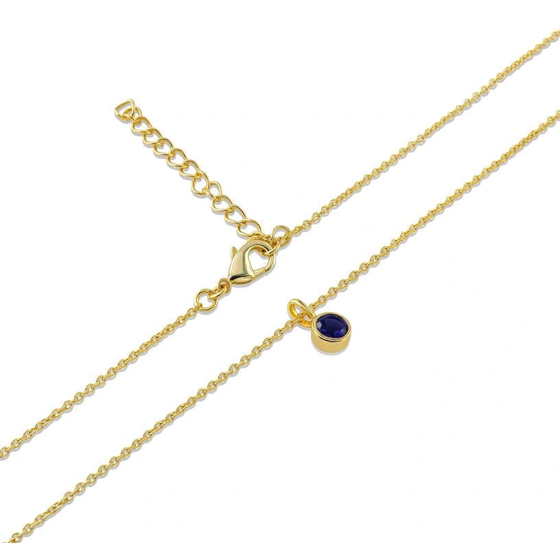 A classic September birthstone necklace designed to symbolize wisdom and strength.

