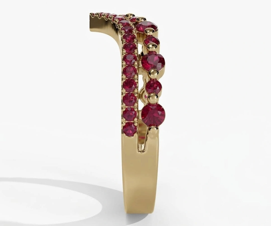 Classic womens ruby ring featuring vibrant red ruby gemstone in a timeless wedding band style