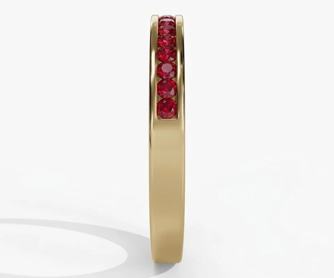 Vintage-inspired womens ruby ring with vibrant red stones in a classic half eternity design