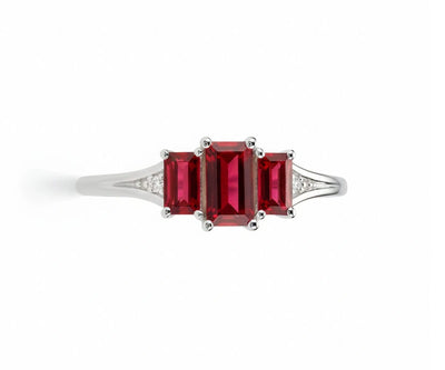 Elegant ruby ring with white zircon stones set in sterling silver for a timeless and radiant look