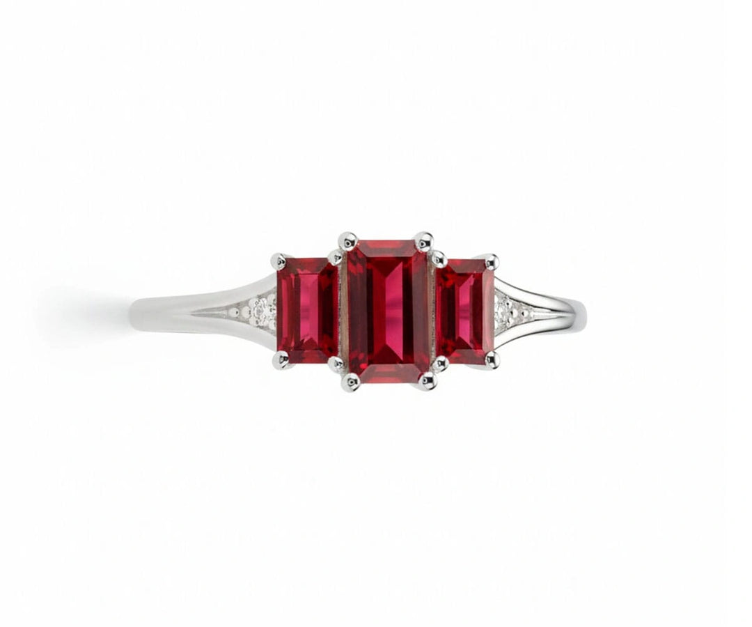 Elegant ruby ring with white zircon stones set in sterling silver for a timeless and radiant look