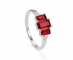 Ruby with white zircon sterling silver ring featuring a vibrant red gemstone surrounded by sparkling zircon accents
