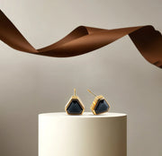 18K yellow gold-plated studs with 7mm Midnight Onyx stones.
