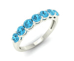 Lightweight gold-plated ring showcasing a brilliant blue topaz hydro gem in sterling silver setting

