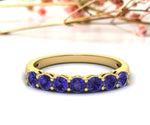 Refined gold-plated sterling silver band with a radiant tanzanite hydro gemstone for timeless elegance

