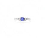 Tanzanite and sterling silver ring that combines rare gemstone brilliance with elegant, everyday sophistication
