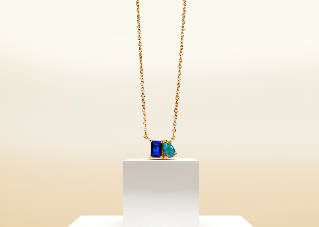 Toi et Moi necklace with blue sapphire and ocean topaz