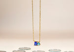 Load image into Gallery viewer, Model wearing two-stone sapphire and topaz necklace
