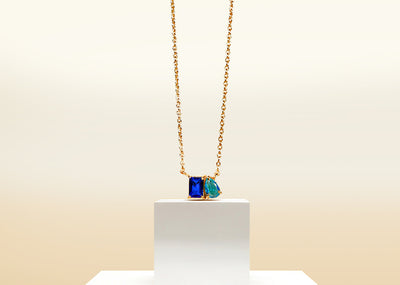 Toi et Moi necklace with blue sapphire and ocean topaz