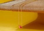 Load image into Gallery viewer, Close-up of colorful two-stone pendant with gold finish
