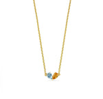 Elegant duo gemstone necklace with a serene ocean topaz and vibrant citrine, set in a heart-shaped gold-plated design for meaningful connection. 


