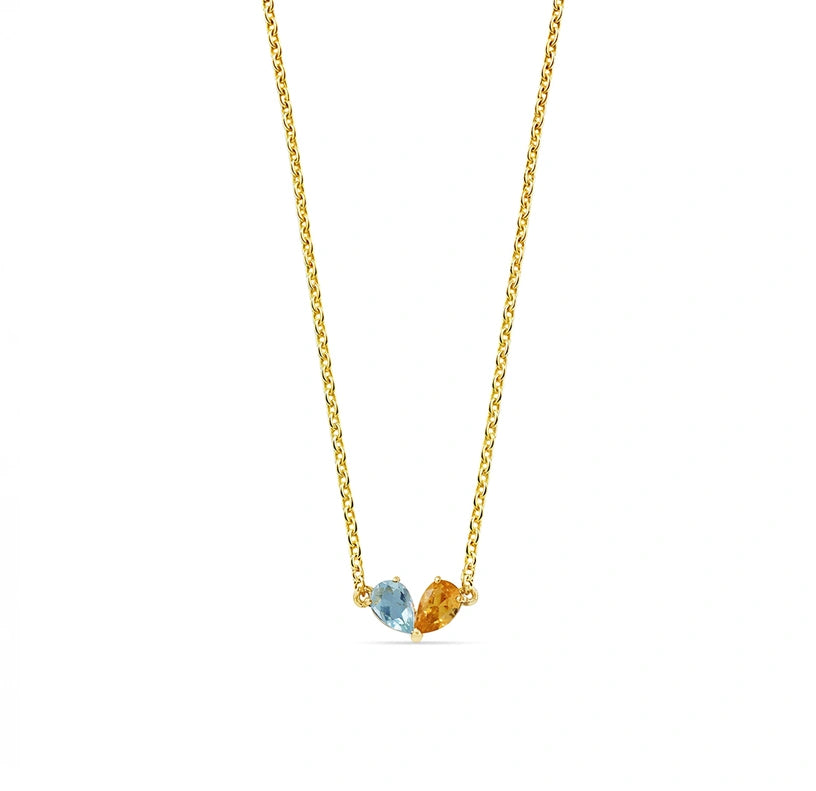 Elegant duo gemstone necklace with a serene ocean topaz and vibrant citrine, set in a heart-shaped gold-plated design for meaningful connection. 

