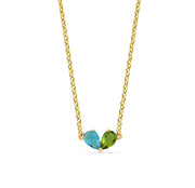 Toi Et Moi pendant necklace featuring pear-cut ocean topaz and peridot stones in a heart-shaped duet, symbolizing vibrant connection and harmony. Ocean Topaz and Peridot Pendant Necklace