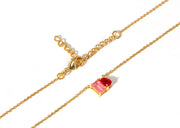 Emerald-cut tourmaline and pear-cut ruby pendant necklace