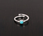 Artisan turquoise gemstone ring with radiant silver setting and bold, bohemian charm

