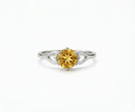 Citrine gemstone ring that radiates warm golden elegance with a touch of sparkling sophistication
