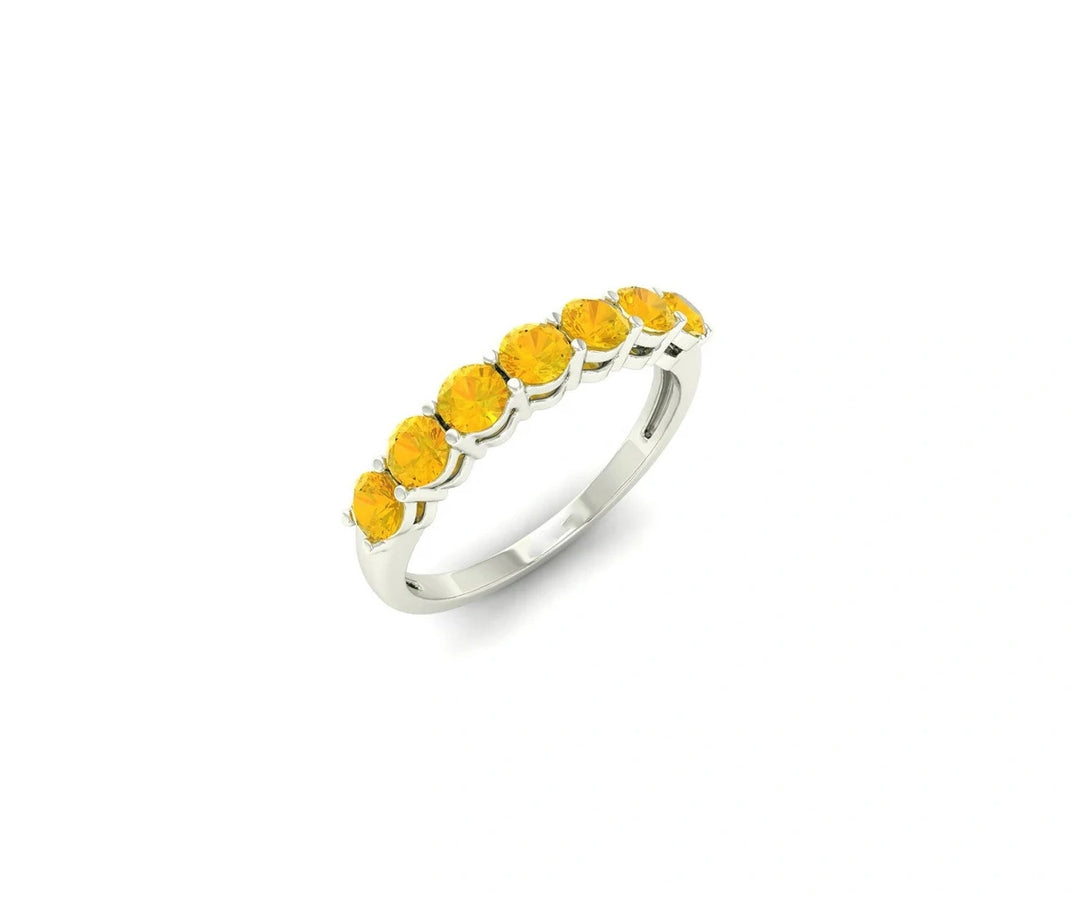
Sleek sterling silver ring showcasing a luminous yellow sapphire, ideal for everyday wear or special moments
