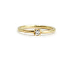 Elegant sterling silver zircon ring with sparkling round cut stone and minimal band
